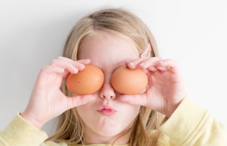 little girl with egg eyes